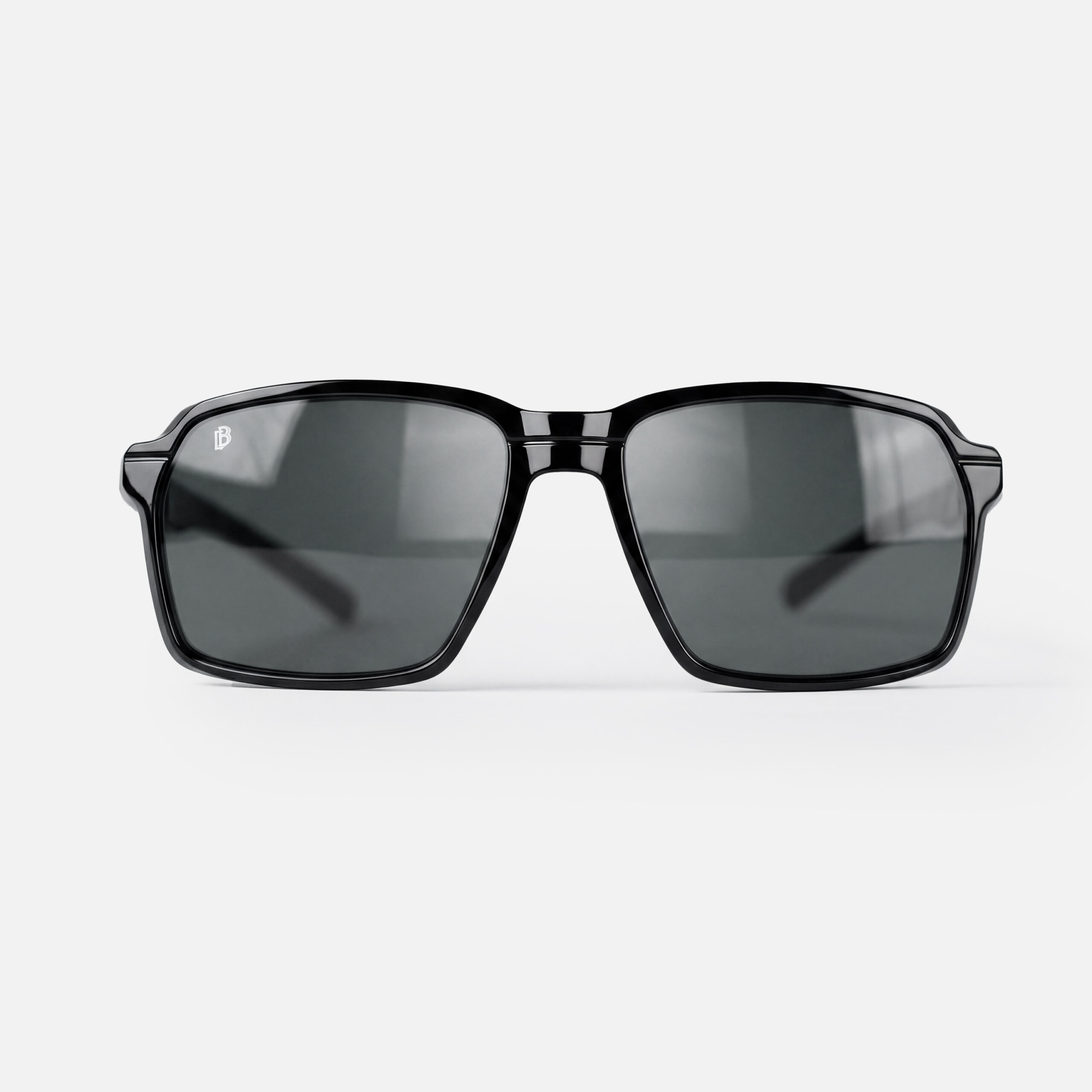 Glossy black square sunglasses with dark lenses and a silver DB monogram.