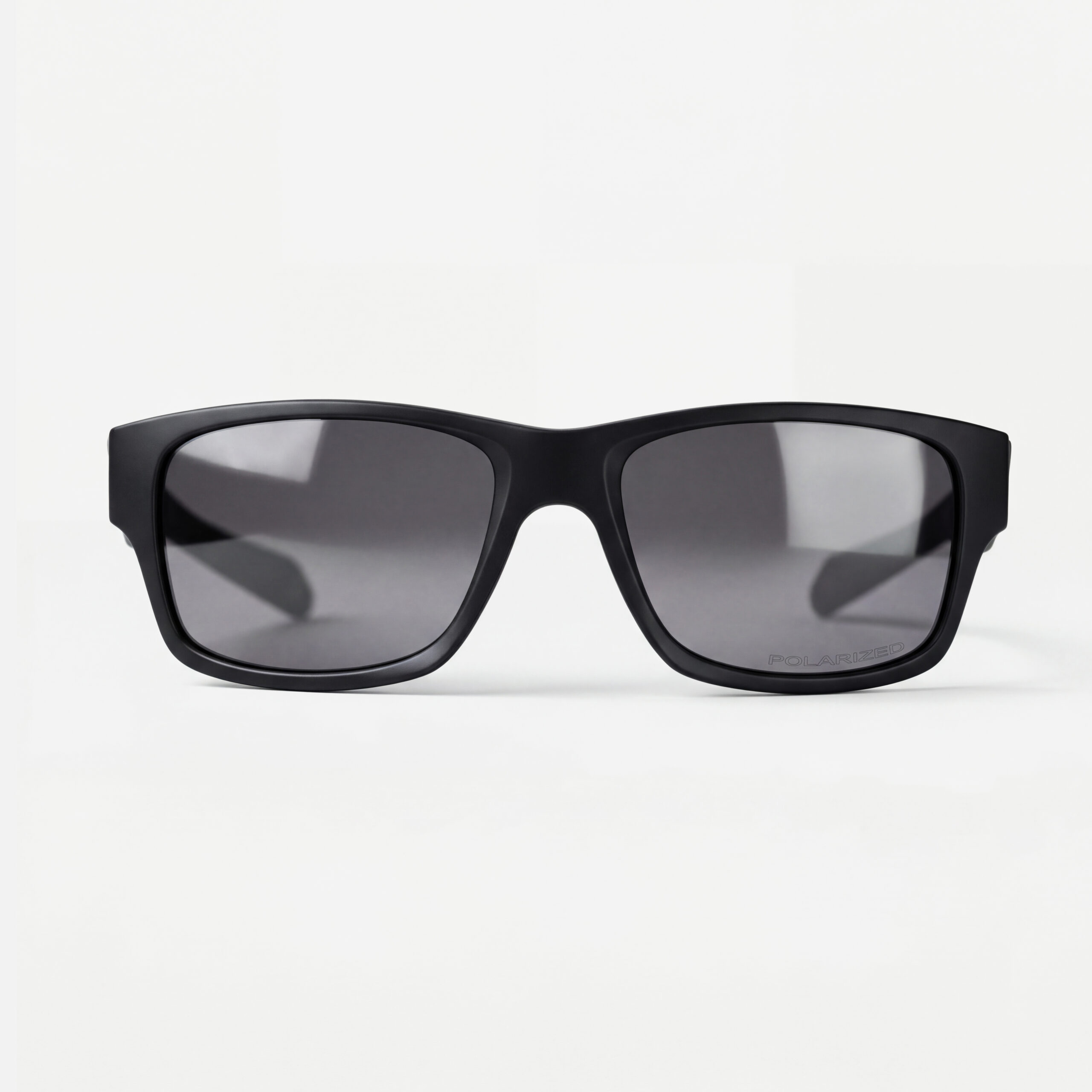 Matte black rectangular sunglasses with dark grey polarized lenses.