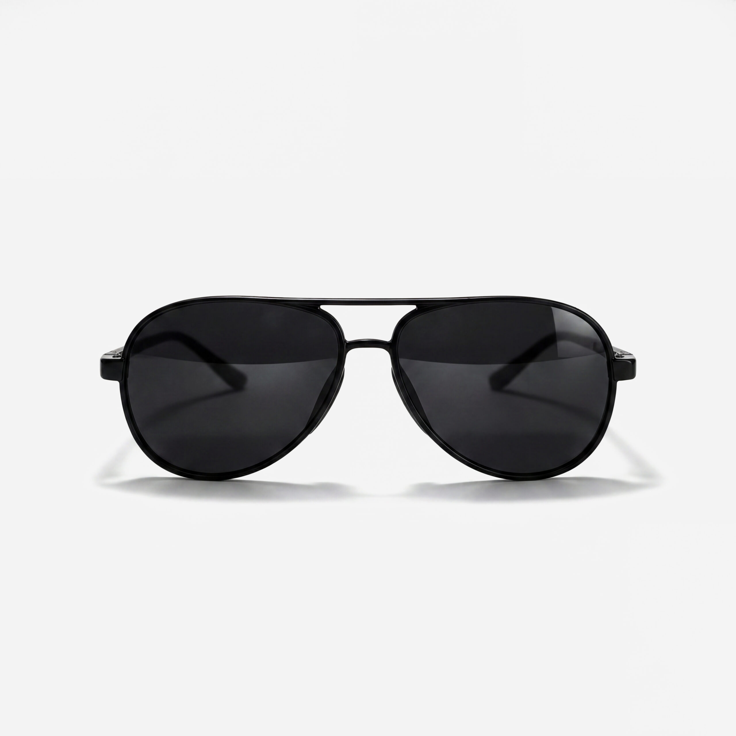 Matte black navigator sunglasses with a slim double bridge and solid dark lenses.