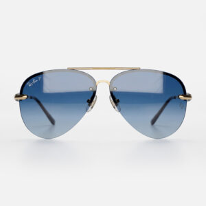 Rimless aviator sunglasses with blue gradient lenses on white background